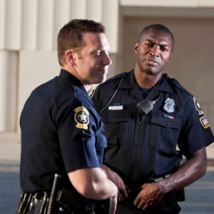 Two police officers working together during a Field Training exercise